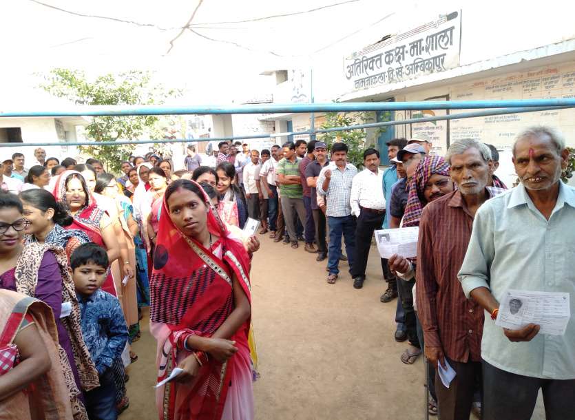 Voters in poling booth