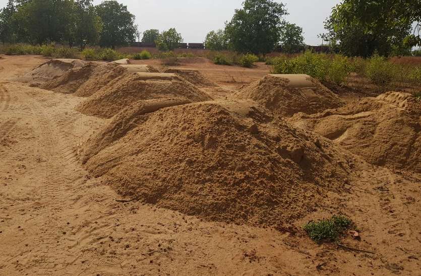 Storage of sand near the river valley after the illegal sand mining