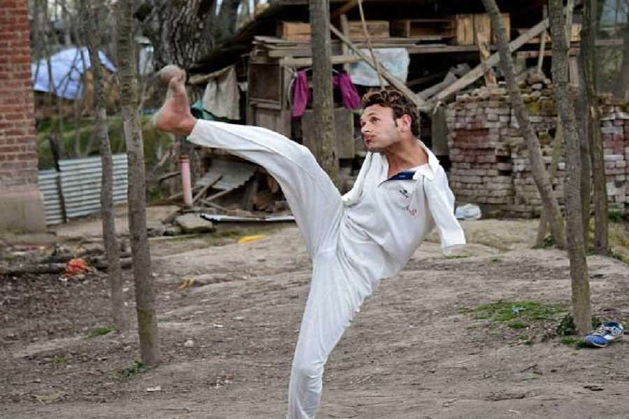 Amir Hussain Lone, an arm less cricket sensation in Kashmir