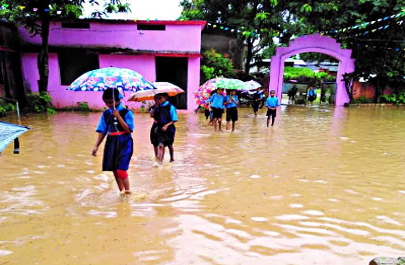 The rain water is causing trouble to students in the school premises