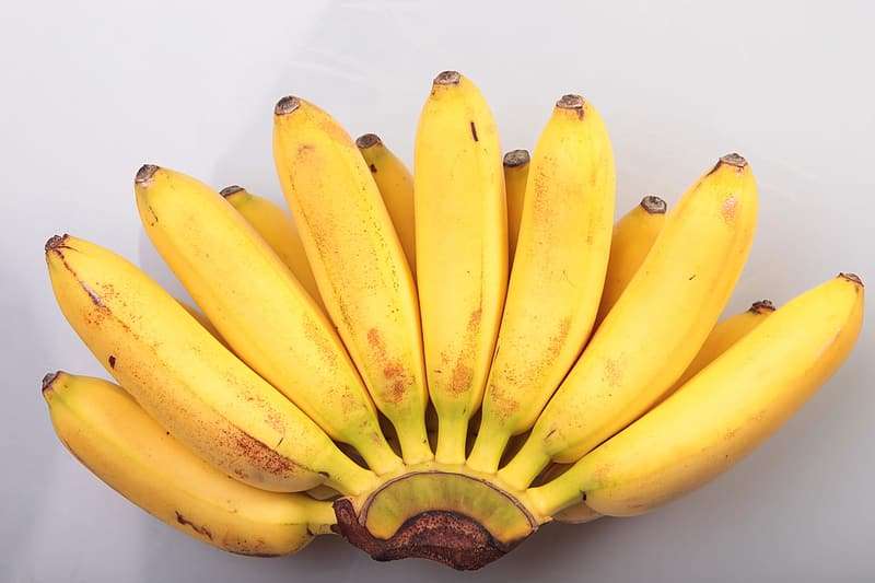 yellow-banana-fruit-on-white-table.jpg
