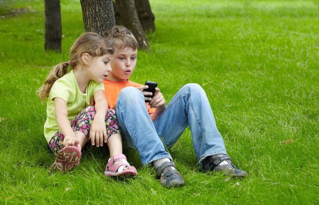 Kids playing on mobile