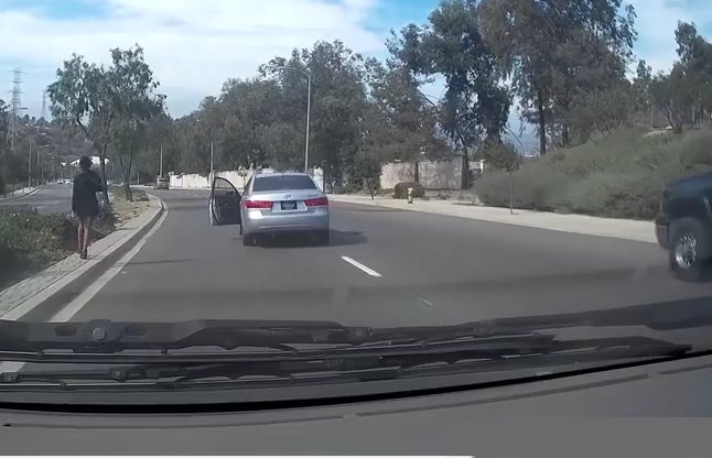 woman jump from car video