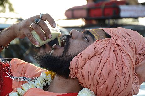 saint taking cold milk 