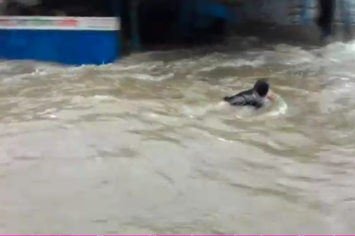 man flows with water