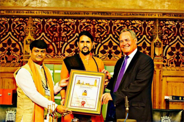 swami Anand giri felicitated as a international yo