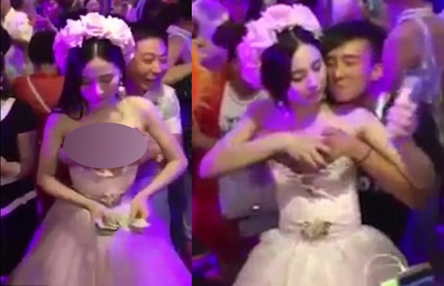 bride allowing guests touching breasts