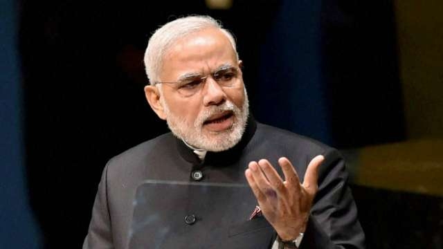 PM defends demonetisation, now says it will help f