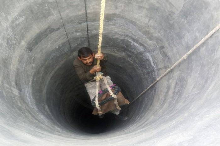 officer into the well
