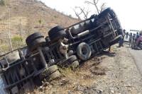 truck overturned, driver and crusher injured 