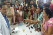 Women Congress worker demand resign of JK loan superintendent 