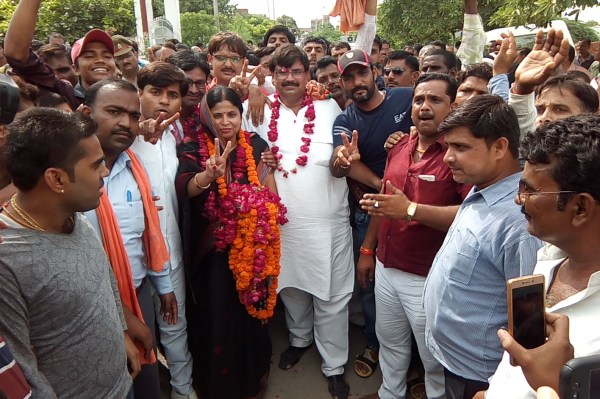 BJP Renu Sharma won block pramukh by election in jhinjhak photos