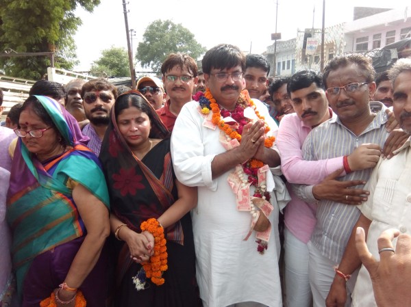 BJP Renu Sharma won block pramukh by election in jhinjhak photos