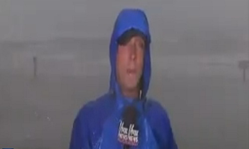 Reporter Covering Hurricane In Texas