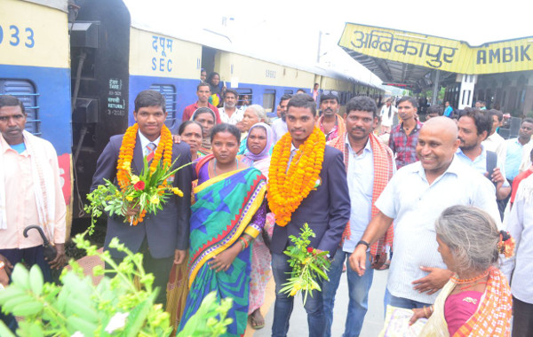 welcomed football players in Railway station