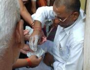 Godman Ashes falling from sai baba Followers hand