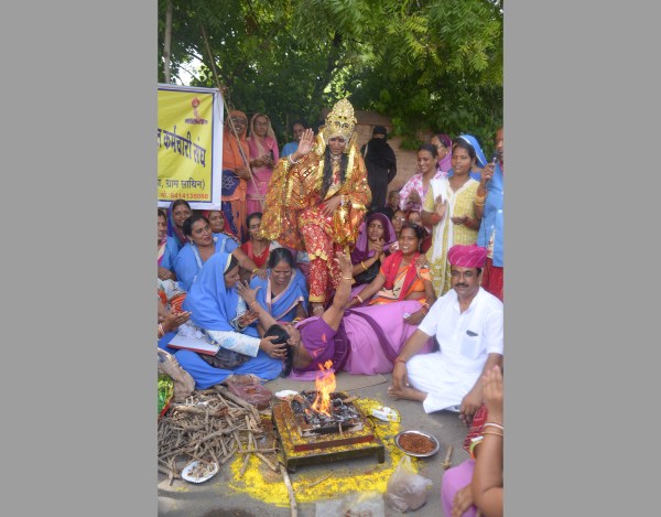 women dressed like Goddess to protest