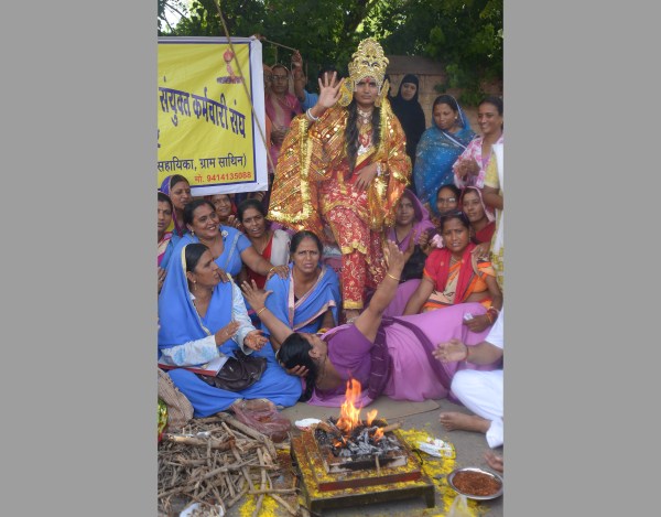 women dressed like Goddess to protest