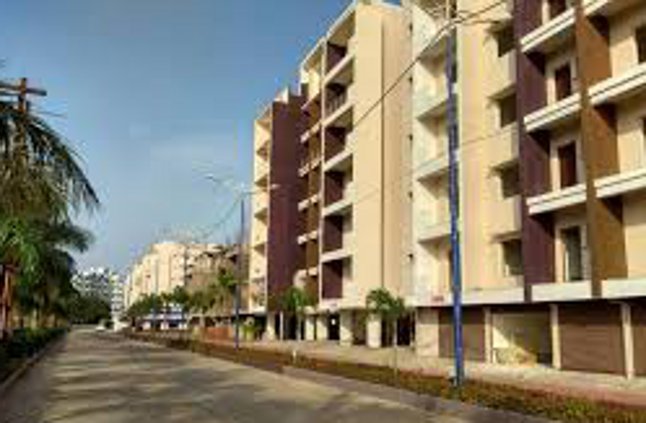 decision: give the flat possession and one lakh rs fines
