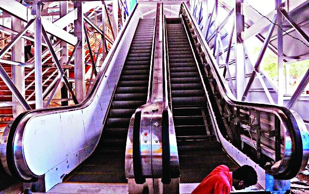 foreigner escalator at railway station