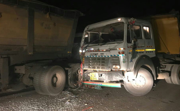Trapped body between 2 vehicles