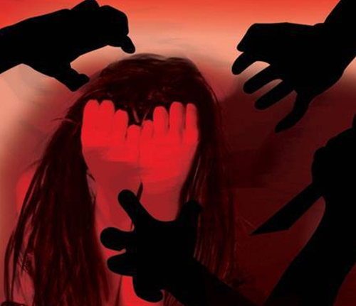 woman raped infront of husband