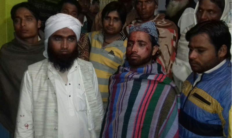 Muslim beaten in running train