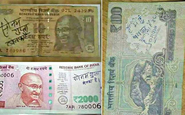 Indian currency notes with writing