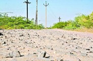 pole between raw road