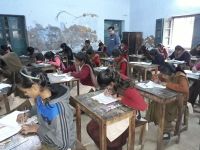 students giving exam