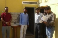 What happened that the officer had come to see the toilet