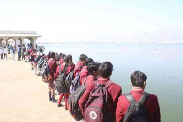 people gathered to enjoy bird fair festival at anasagar lake