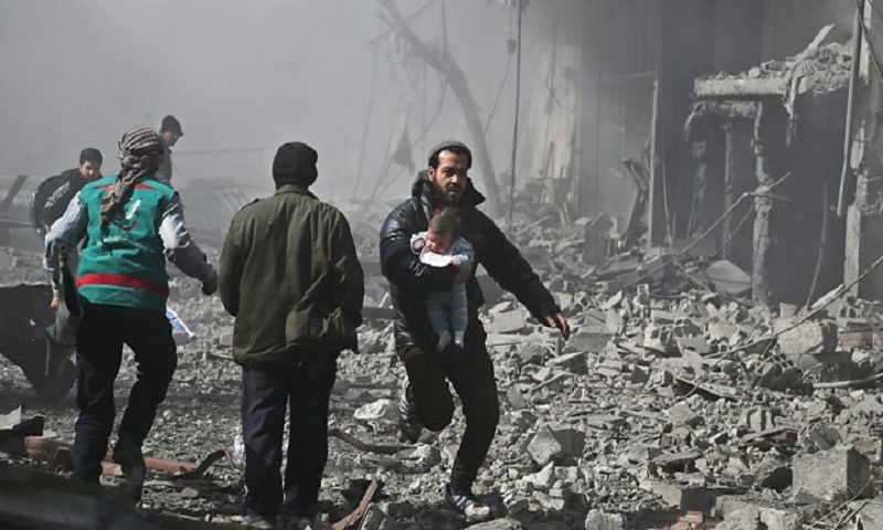 A man trying to rescue his child in syrian attack