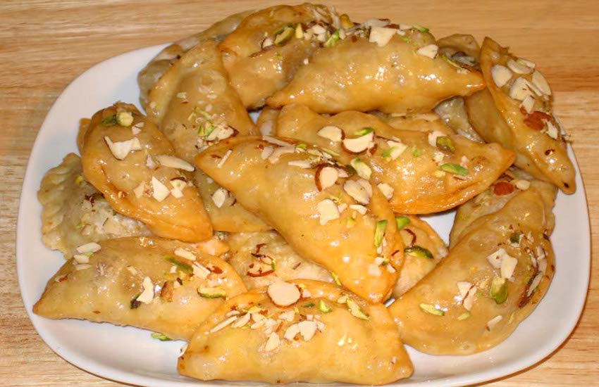 recipes for healthy and tasty special gujiya in holi 2018,holi 2018 date in india calendar,festival 2018,hindu calendar 2018 with tithi in hindi,dhulandi 2018,holi and dhulandi 2018,holi special recipes by sanjeev kapoor,special dish of holi 2018,holi sweets,Holi sweets,gujia recipe with khoya and suji in hindi,delicious gujiya recipe for holi,delicious gujiya recipe for holi 2018,suji mawa gujiya recipe in hindi,Jabalpur,Holi 2018,holi 2018 date in india,happy holi 2018,holi 2018 festival,Holi 2018 Special,