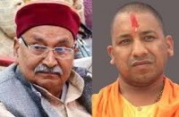 CM Yogi Adityanath and Harishankar Tiwari