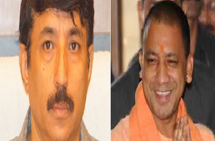 CM Yogi Adityanath and GorakhpurDM Rajeev Rautela