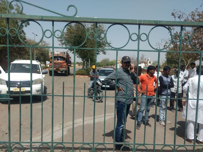 Do not get salaries after 6 months, locked at the gate of the colony