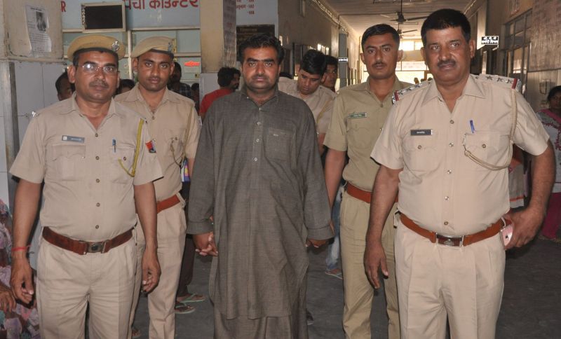 police taking accused for medical checkup