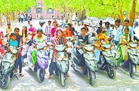 meritorious girls students,get scooty