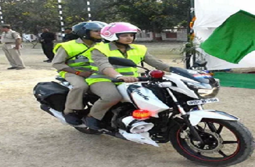 Lady Anti Romeo Squad in Benaras who run bike wearing Pink Helmet