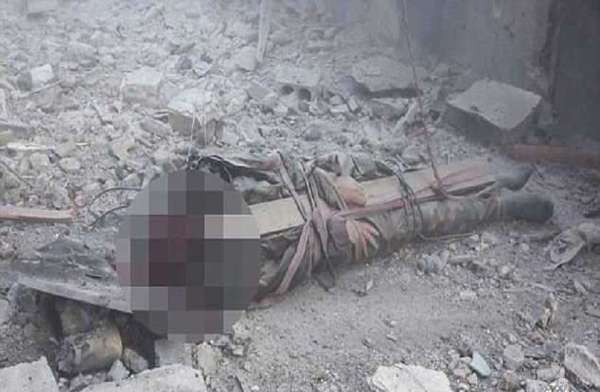 isis news,Isis Syria Iraq,Horrifying images,isis syria,ISIS turn a prisoner into an airborne bomb,fitting explosives in helmet,latest method of execution,
