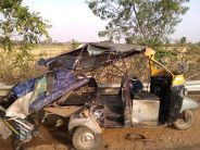 Collision in auto and bus, woman's death