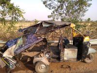 Collision in auto and bus, woman's death