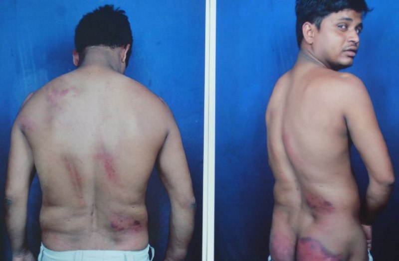 men beated by police