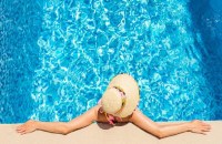 photo of Woman and hotel pool case of expectation vs reality