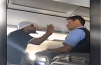 Passenger flights after being refused to serve alcohol