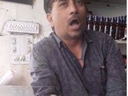 liquor salesman taking larger amount then printed rate