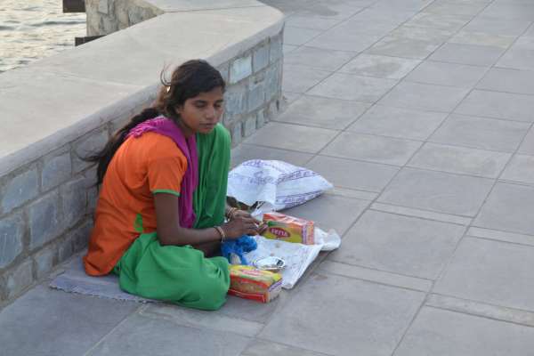 they are selling fish food near anasagar lake