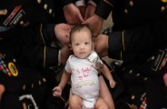 Army unit takes touching photos with martyr fellow soldiers daughter
