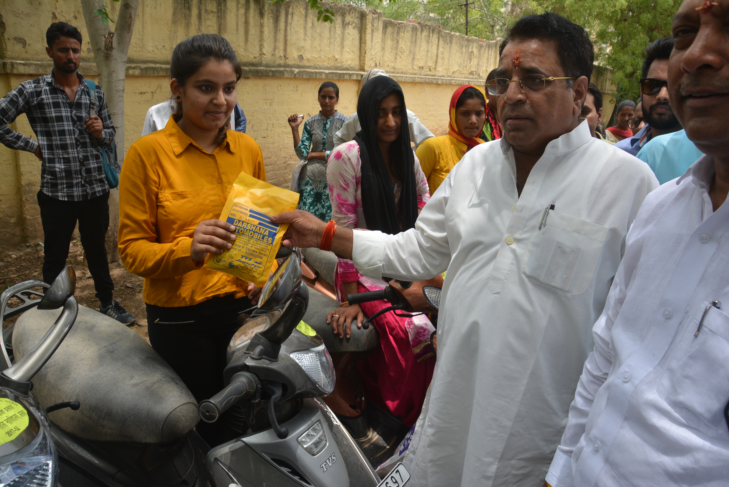 Scooty distribution to talented girls of alwar
